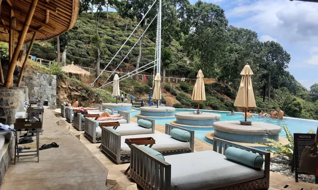infinity pool at 98 Acres Resort & Spa overlooking Ella’s mountain landscape.