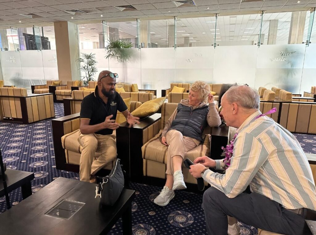 Our clients receiving personal assistance from a Luxurious Lanka representative at the Silk Route lounge.