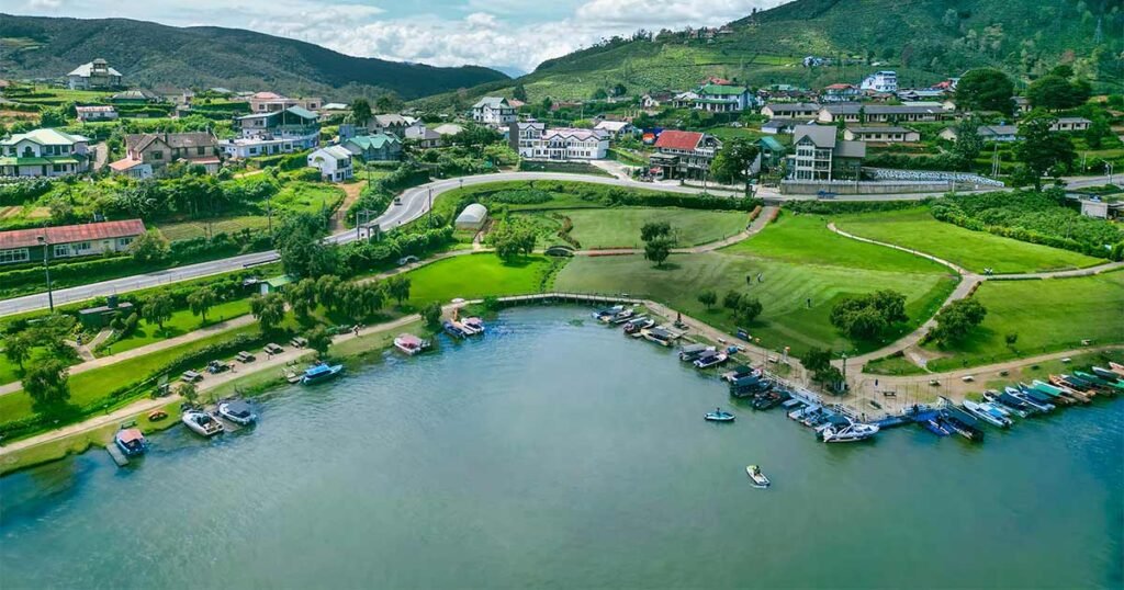 Aerial view of Gregory Lake surrounded by green parks and Nuwara Eliya’s hills.