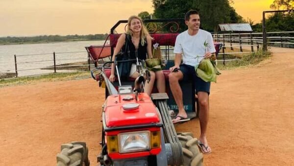 Tourists enjoying a tractor ride in Hiriwaduna, Sri Lanka.