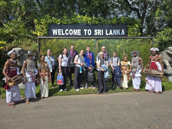 Family welcomed to Sri Lanka with traditional Kandyan dancers.
