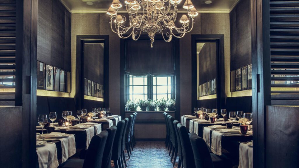 Elegant Dinning interior at Tintagel Colombo with classic furnishings and chandeliers.