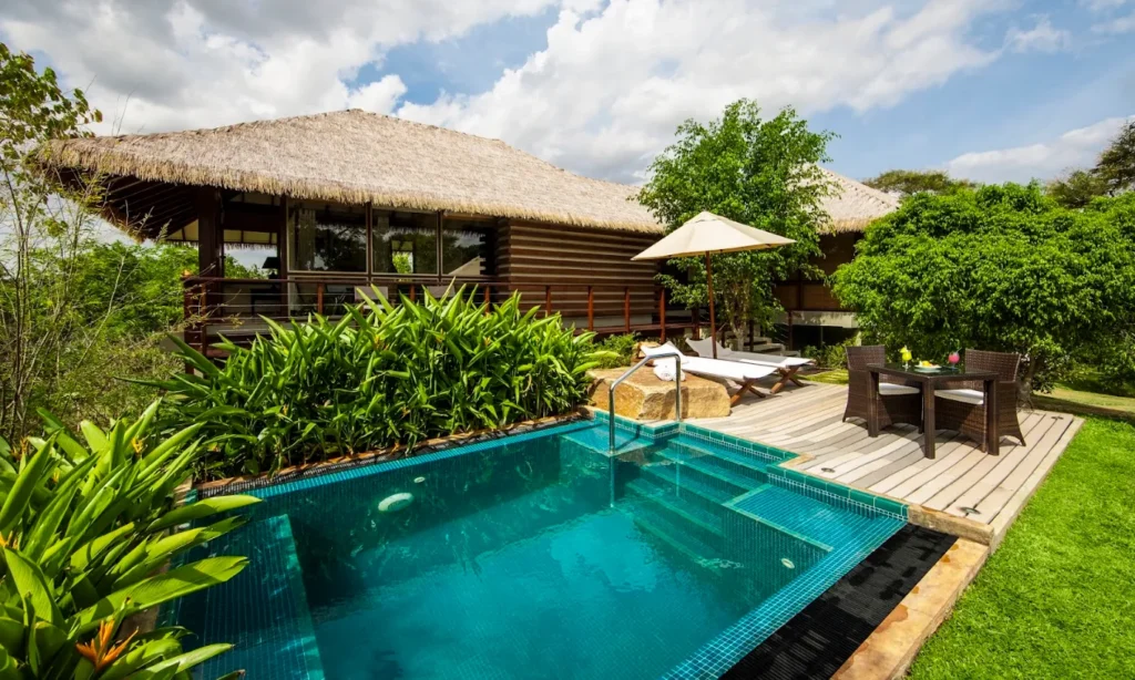 Private pool villa surrounded by lush tropical gardens at Uga Ulagalla.