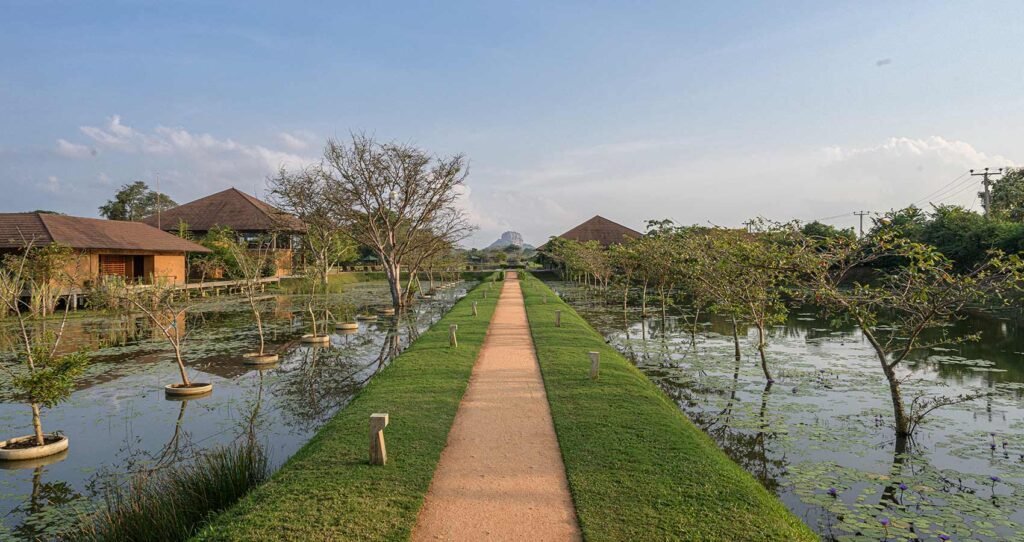 Water Garden Sigiriya surrounded by tranquil ponds, landscaped gardens and distant views of Sigiriya Rock.