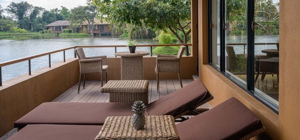 Private terrace overlooking tranquil waterways and landscaped gardens at Water Garden Sigiriya.
