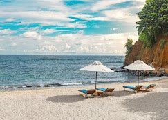 Private beach with sun loungers and ocean views at Cape Weligama.