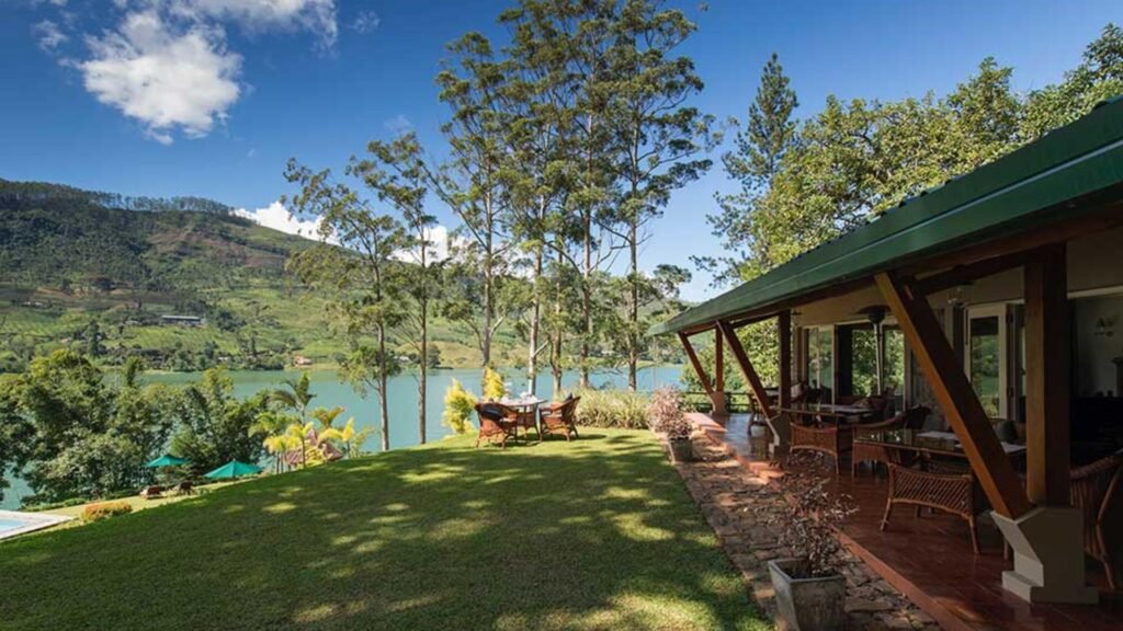 Lakeside bungalow and garden at Ceylon Tea Trails, Sri Lanka.