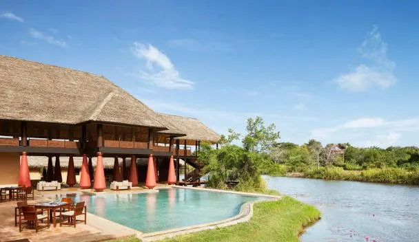 Jetwing Vil Uyana pool overlooking peaceful wetlands in Sigiriya.