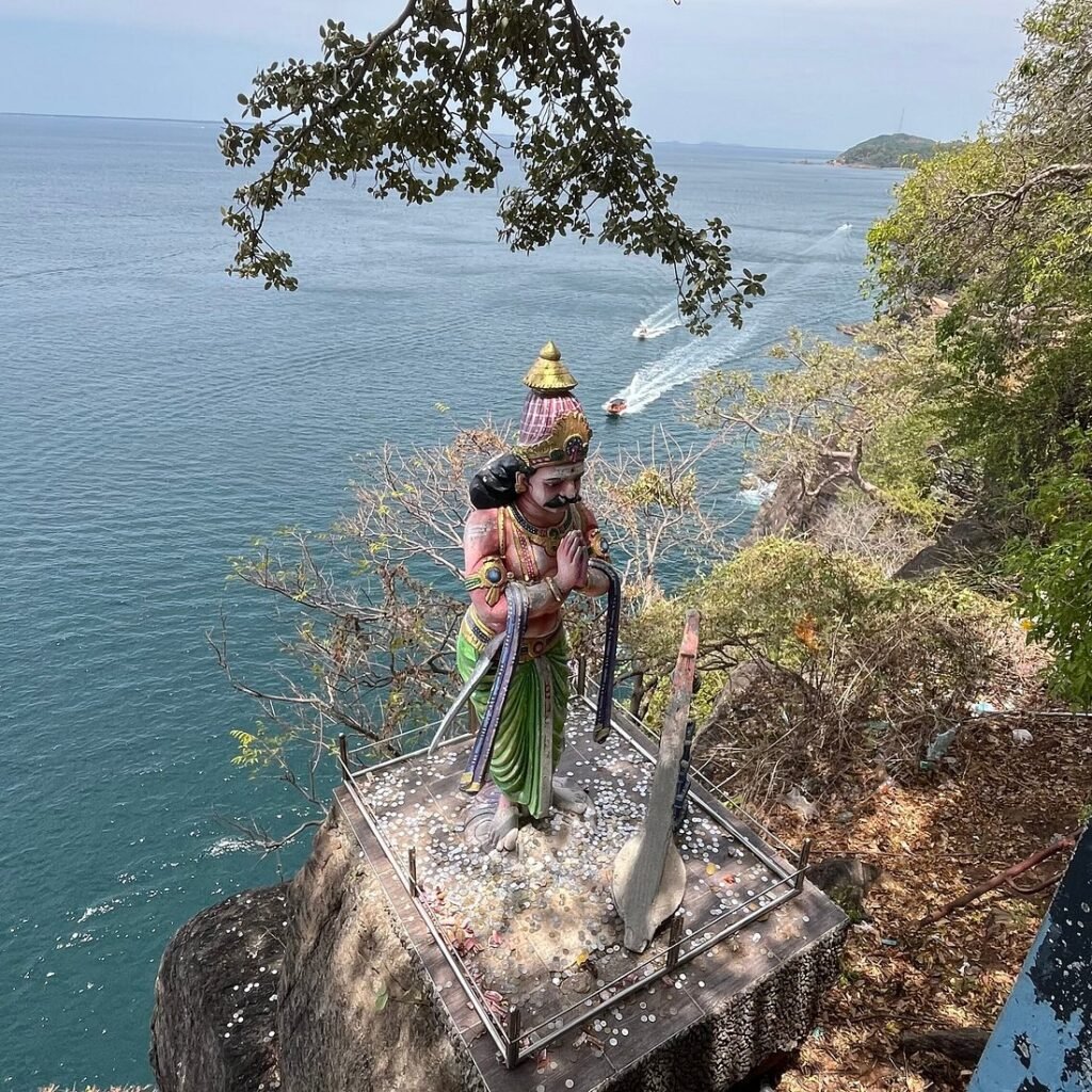 Guardian statue overlooking the ocean near Koneswaram Temple in Trincomalee.