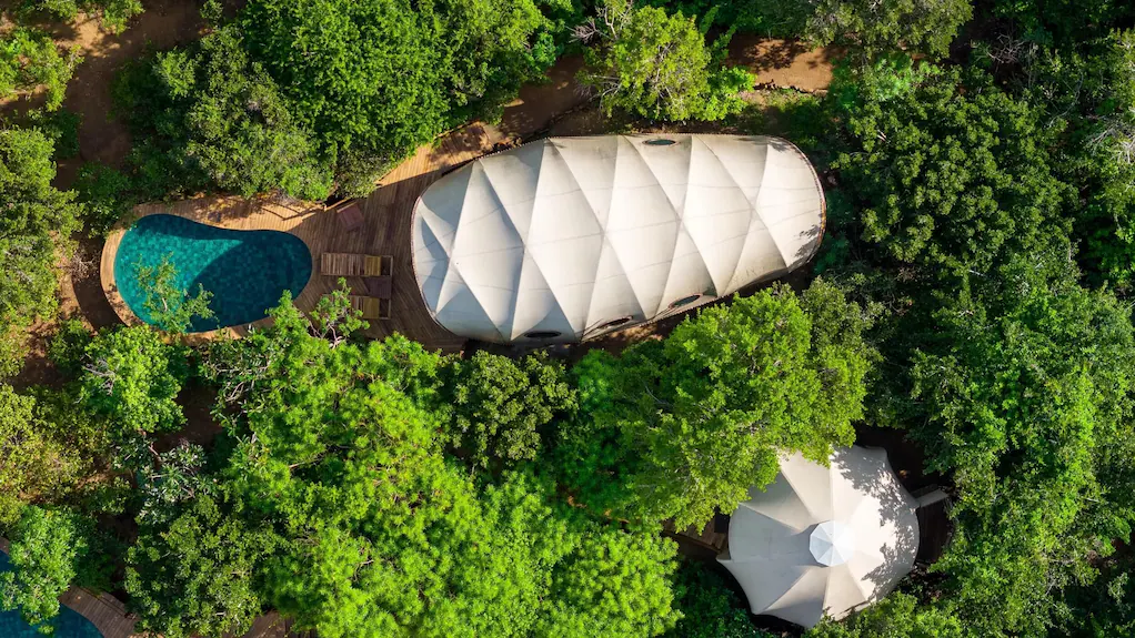 Aerial view of a cocoon suite with a private pool at Wild Coast Tented Lodge Yala.