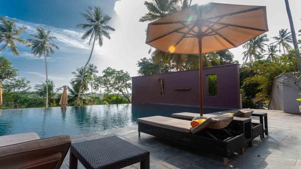 Poolside loungers at Kahanda Kanda Sri Lanka