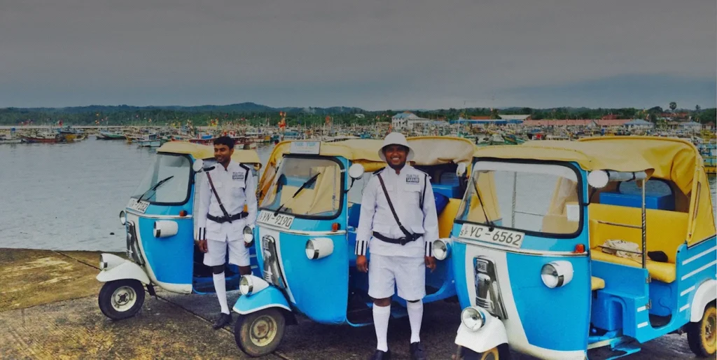 Tuk tuk safari drivers with colourful tuk tuks in Sri Lanka