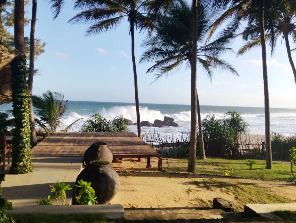 Turtle Bay Hotel surrounded by tropical gardens with a pool in Sri Lanka
