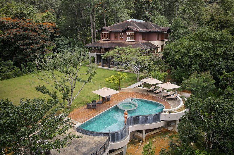 Dendrobium House with swimming pool surrounded by lush greenery in Sri Lanka